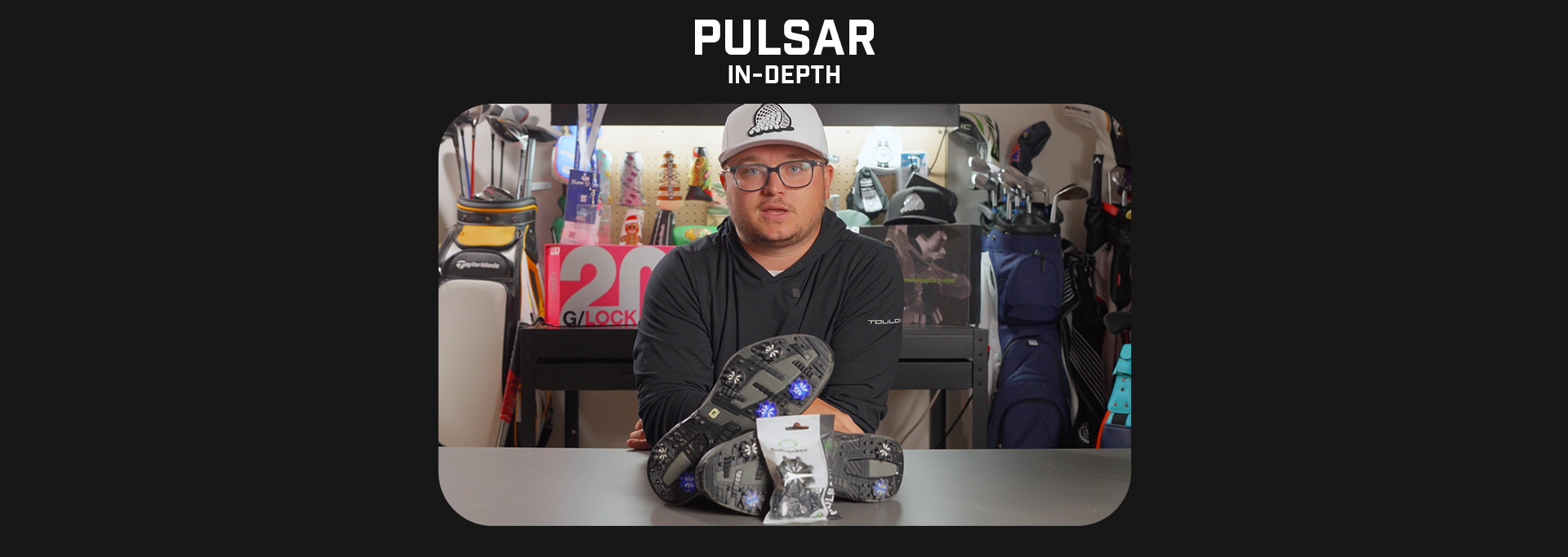 Jake Morrow explaining the Pulsar golf spike in a garage setting. 