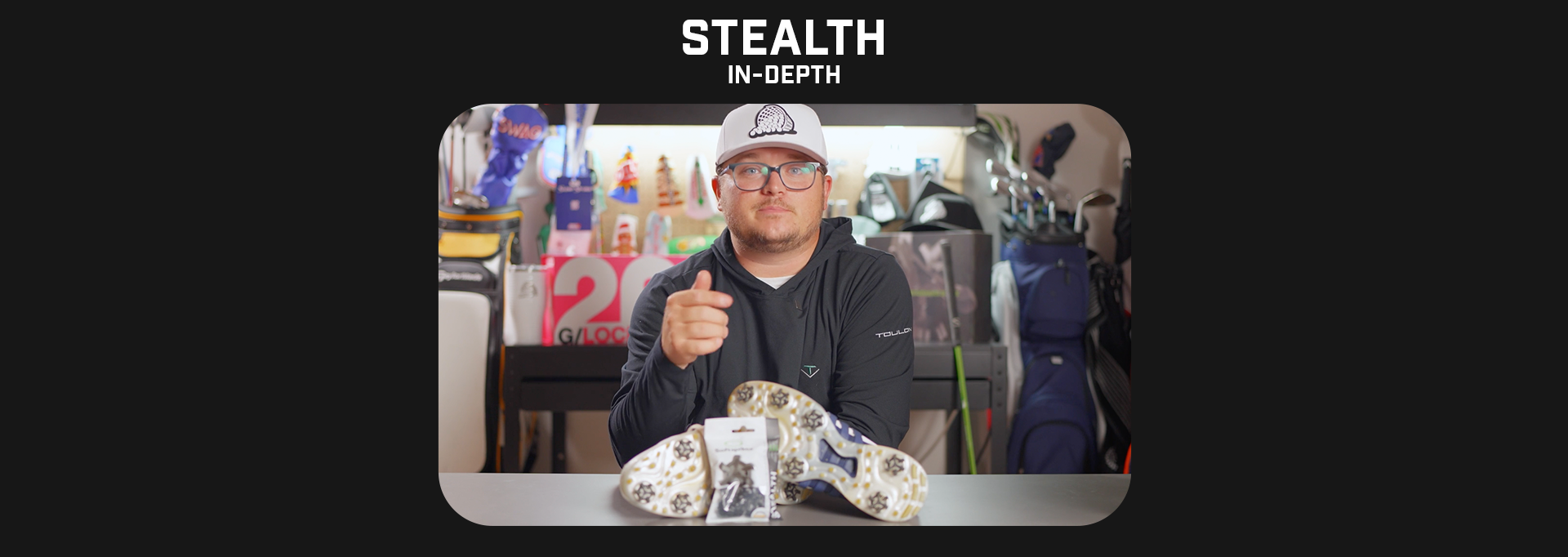 Jake Morrow explaining the Stealth spikes in a garage setting. 
